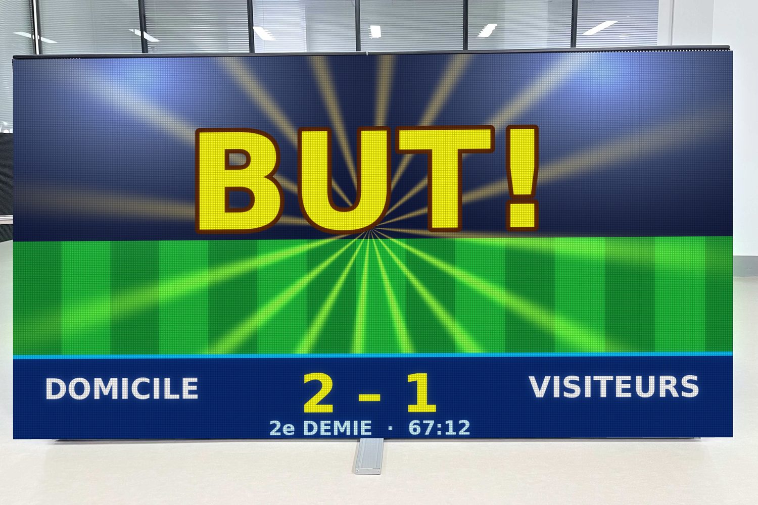 Écran DEL de sport allumé qui affiche un but et le pointage